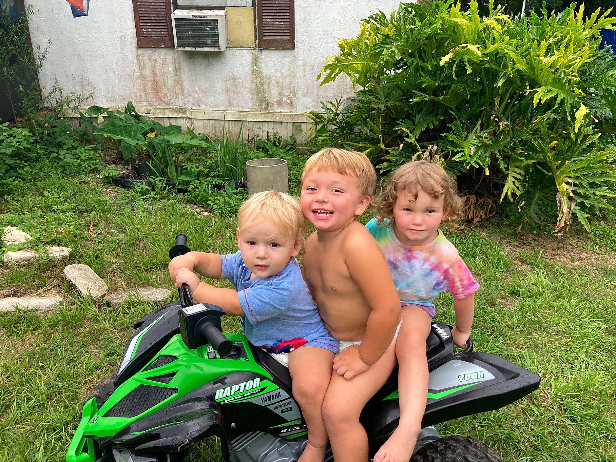 Brantley Damron joined the competition — help win amazing prizes! child, event, fun, grass, green, joy, landscape, lap, lawn, leisure, motor_vehicle, people_in_nature, person, plant, recreation, shorts, smile, summer, swimwear, tire
