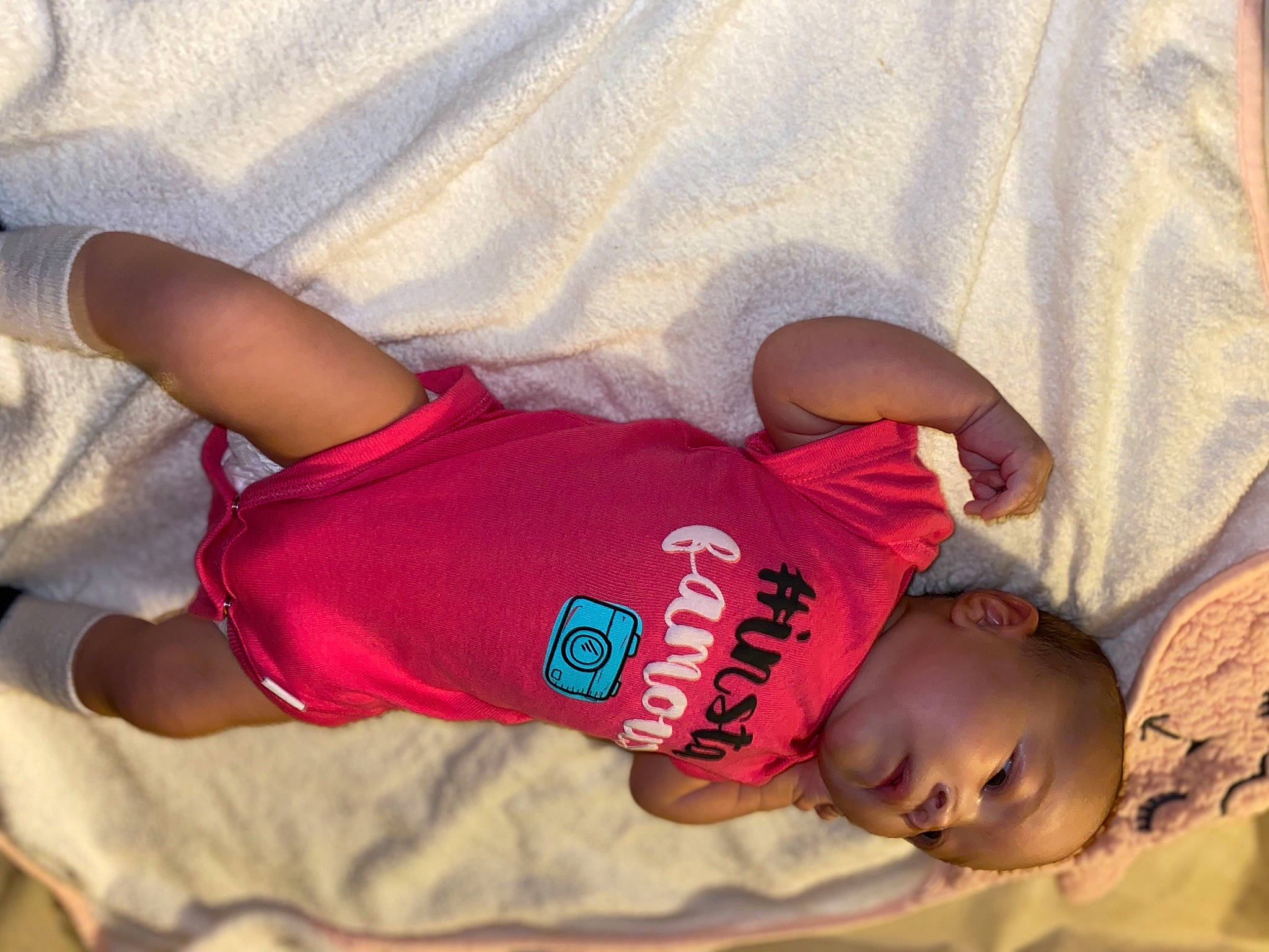 Auria is registered to the contest to win money with this photo: arm, baby, baby_toddler_clothing, child, person, pink, toddler