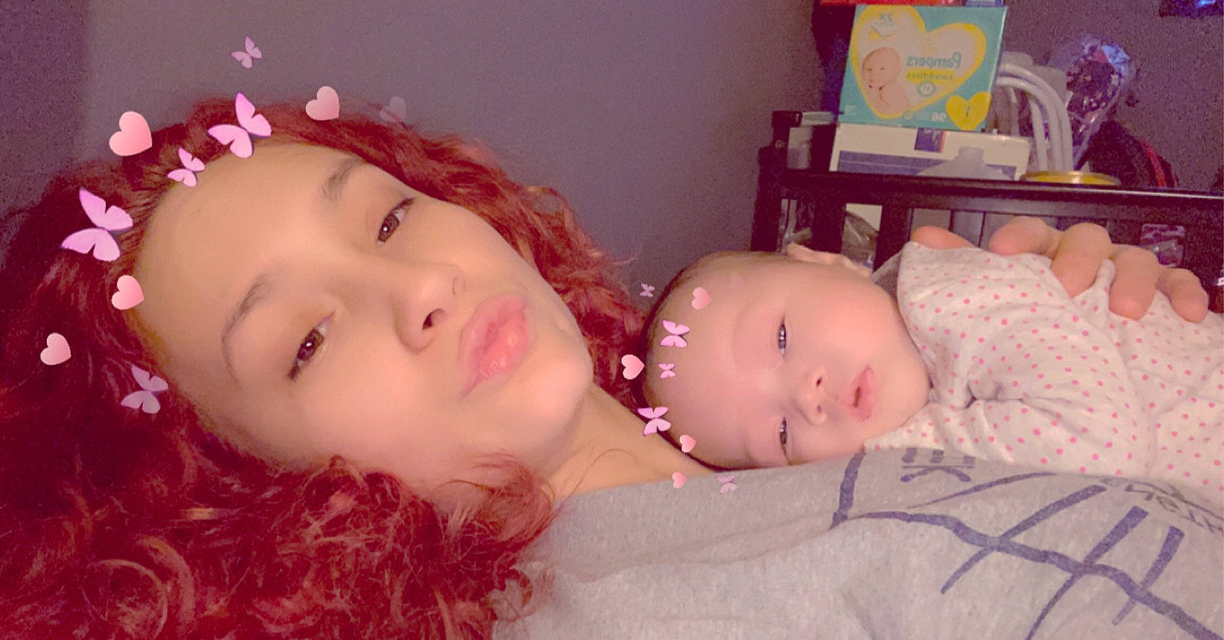 Auria is registered to the contest to win money with this photo: baby, bedtime, cheek, child, ear, eye, face, hair_accessory, head, iris, lip, mouth, nose, person, pink, skin, smile, toddler