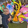 Owen a rejoint le concours — aidez-le/la à gagner de superbes lots ! baby, child, lantern, colorful, outdoor, festival, lights, night, person, jacket, hand, art, decoration, tree, street, building, smile, face, celebration, winter