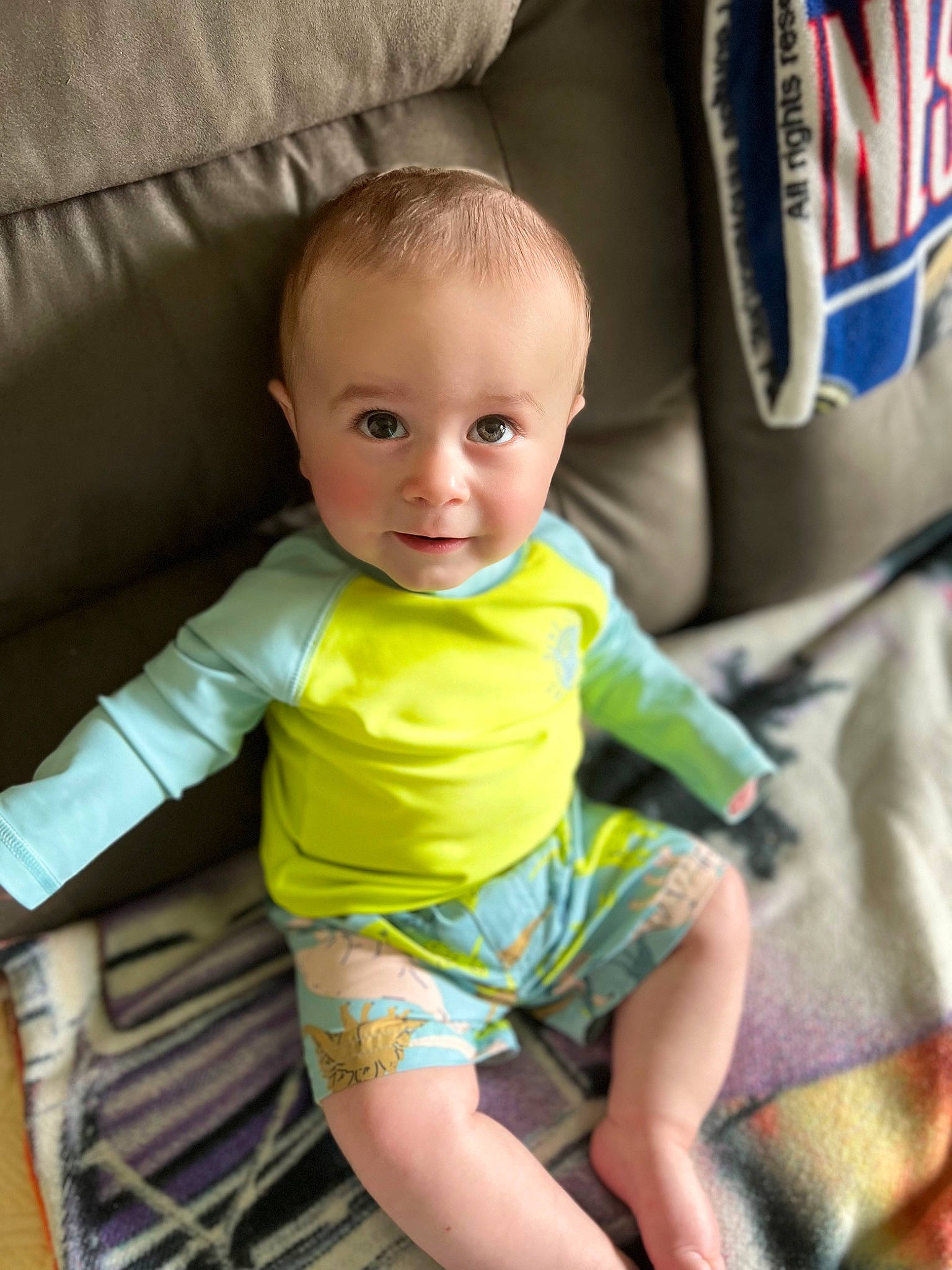 Grayson joined the competition — help win amazing prizes! baby, baby_products, baby_toddler_clothing, cheek, child, comfort, elbow, eye, fun, happy, human_leg, knee, person, product, sitting, skin, sleeve, smile, t_shirt, thigh