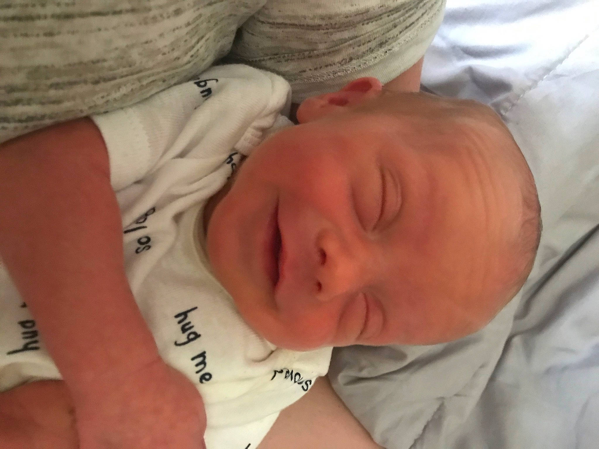 Trenton is registered to the contest to win money with this photo: baby, baby_sleeping, bedtime, birth, child, ear, finger, hand, nap, nose, person, skin, sleep