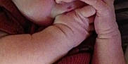 Forest is registered to the contest to win money with this photo: baby, infant, sleeping, hand, face, clothing, pattern, animal_print, resting, closeup, skin, newborn, cute, peaceful, child, person, soft, fingers, nap, indoors