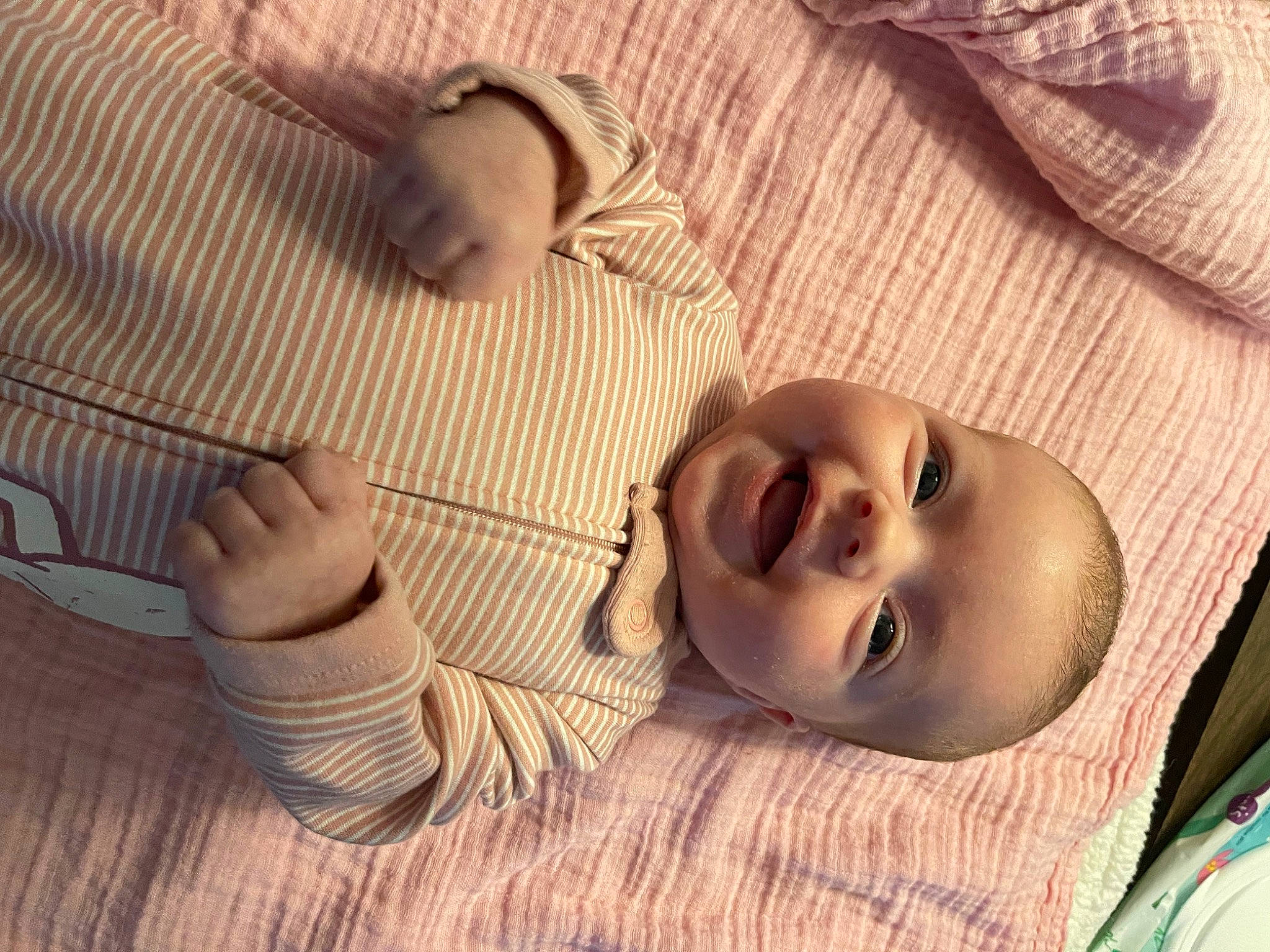 Lorelei is registered to the contest to win money with this photo: baby, baby_toddler_clothing, cheek, comfort, eye, eyebrow, facial_expression, flooring, happy, head, human, mammal, mouth, nose, person, skin, smile, textile, toddler, vertebrate