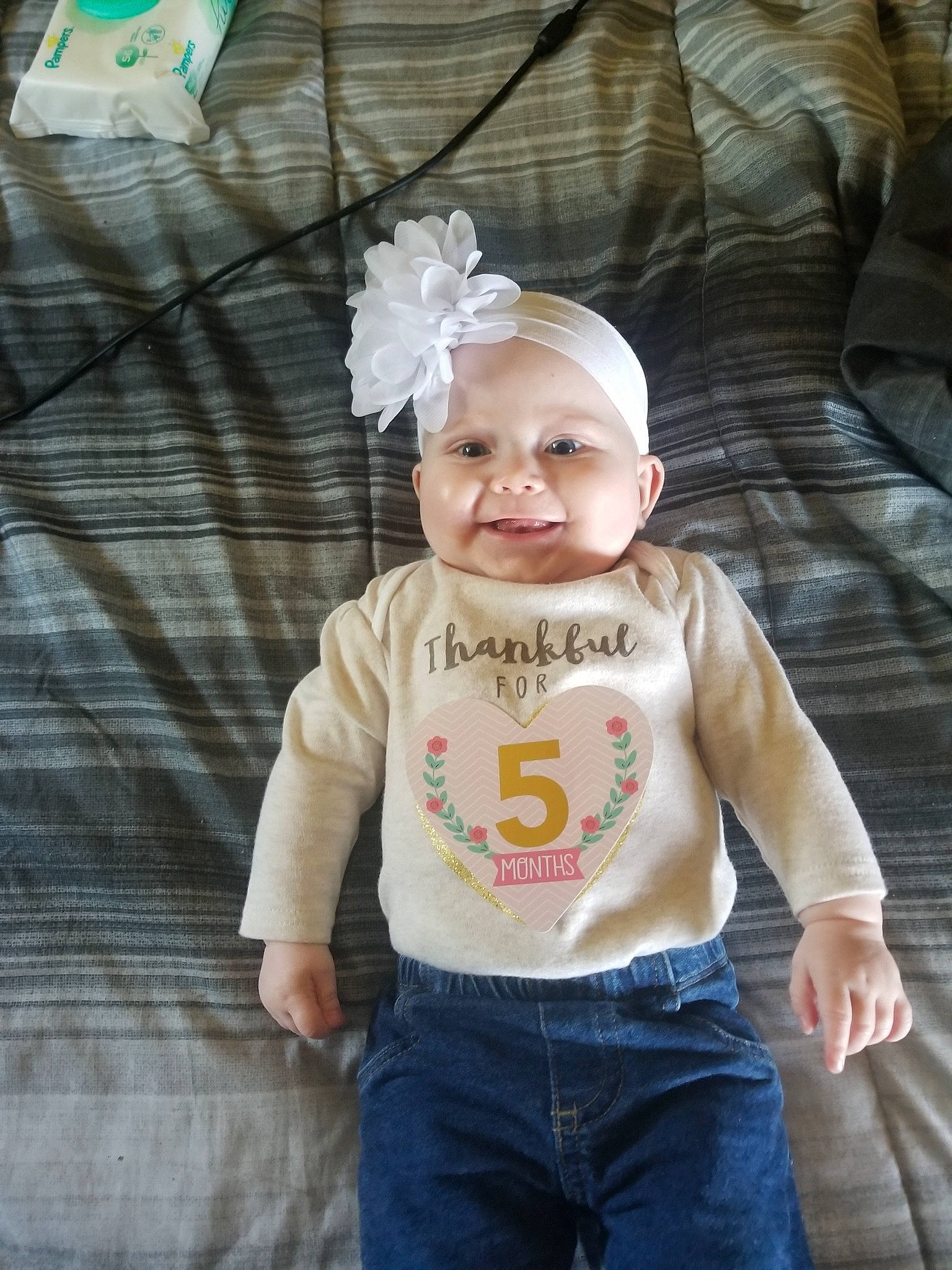 Chevy Cheyenne Marie joined the competition — help win amazing prizes! baby, baby_products, baby_toddler_clothing, child, headgear, outerwear, pattern, person, product, sleeve, smile, t_shirt, toddler