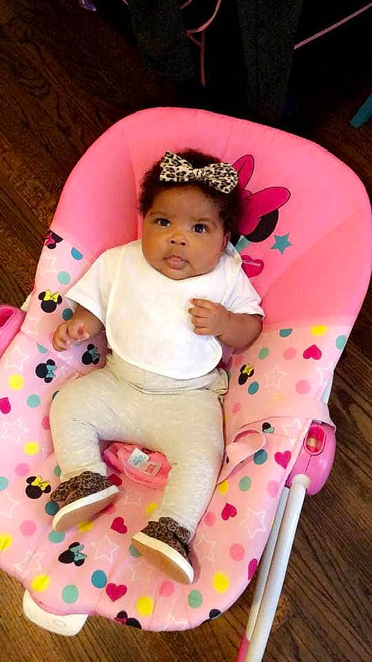 Kaleigh joined the competition — help win amazing prizes! baby, baby_products, baby_toddler_clothing, cap, cheek, child, comfort, event, face, fun, happy, magenta, pattern, person, pink, purple, sitting, skin, sleeve, sock