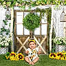 baby, child, toddler, portrait, smiling, sitting, outdoor, garden, flowers, sunflowers, plants, greenery, floral, nature, decor, birdcage, lantern, rustic, yellow_headband, festive