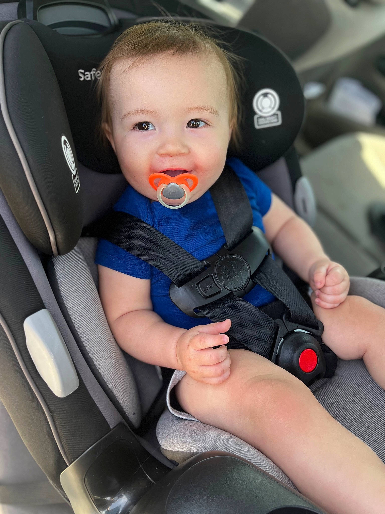 Caspian is registered to the contest to win money with this photo: auto_part, automotive_design, baby, baby_carriage, baby_in_car_seat, car, car_seat, car_seat_cover, comfort, electric_blue, gesture, head_restraint, motor_vehicle, nail, person, seat_belt, smile, steering_part, steering_wheel, toddler