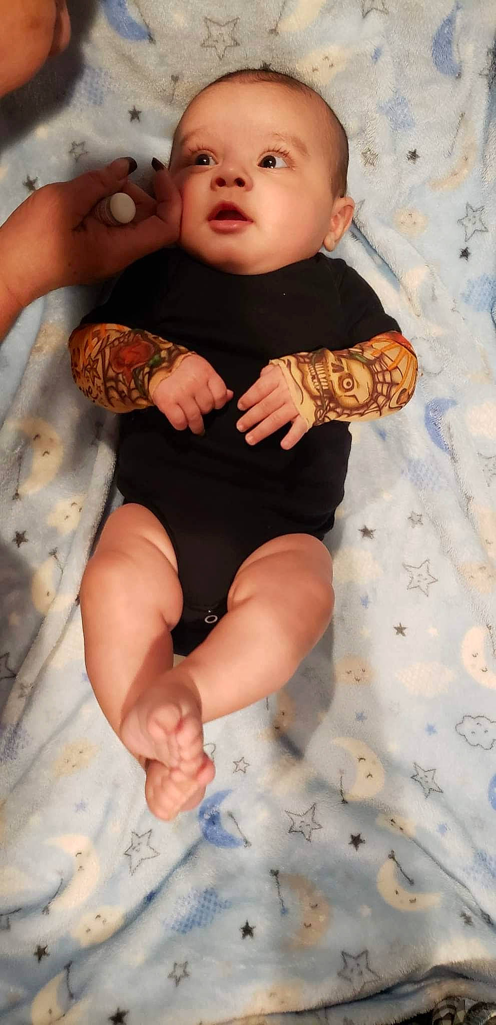 Jordan Jr is registered to the contest to win money with this photo: arm, baby_toddler_clothing, eye, finger, gesture, hand, happy, head, human_body, joint, knee, leg, mouth, neck, person, skin, sleeve, stomach, thigh, thumb