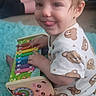 baby, bear_pattern, blue_rug, carpet, child, cute, floor, hands, happy, indoors, legs, onesie, person, playing, sitting, smile, toddler, tongue_out, toy, xylophone