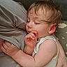Orlando joined the competition — help win amazing prizes! baby, sleeping, child, hand, face, arm, person, closeup, cuddle, comfort, indoor, soft_light, skin, infant, parent, rest, peaceful, toddler, white_clothing, hair