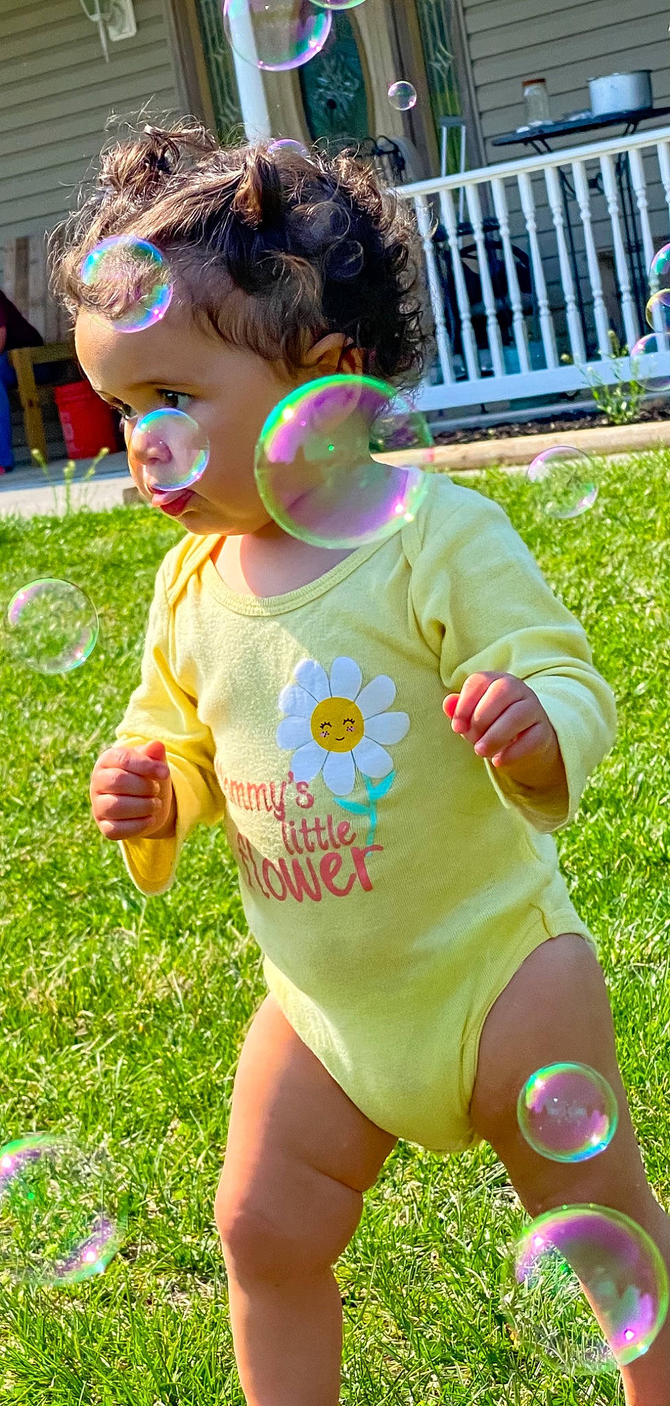 Haisley is registered to the contest to win money with this photo: baby_toddler_clothing, child, cool, eyewear, fence, fun, grass, green, happy, leisure, magenta, people_in_nature, person, pink, plant, recreation, sleeve, summer, t_shirt, thumb