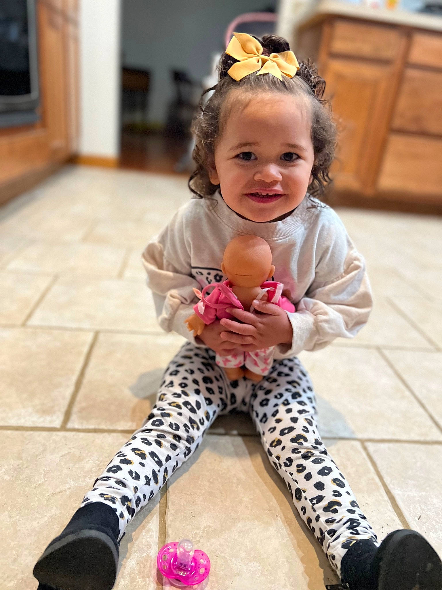 Haisley Mae joined the competition — help win amazing prizes! baby, baby_toddler_clothing, cabinetry, child, floor, flooring, foot, hair, happy, head, human_leg, joy, knee, leg, pattern, person, pink, skin, sleeve, thigh