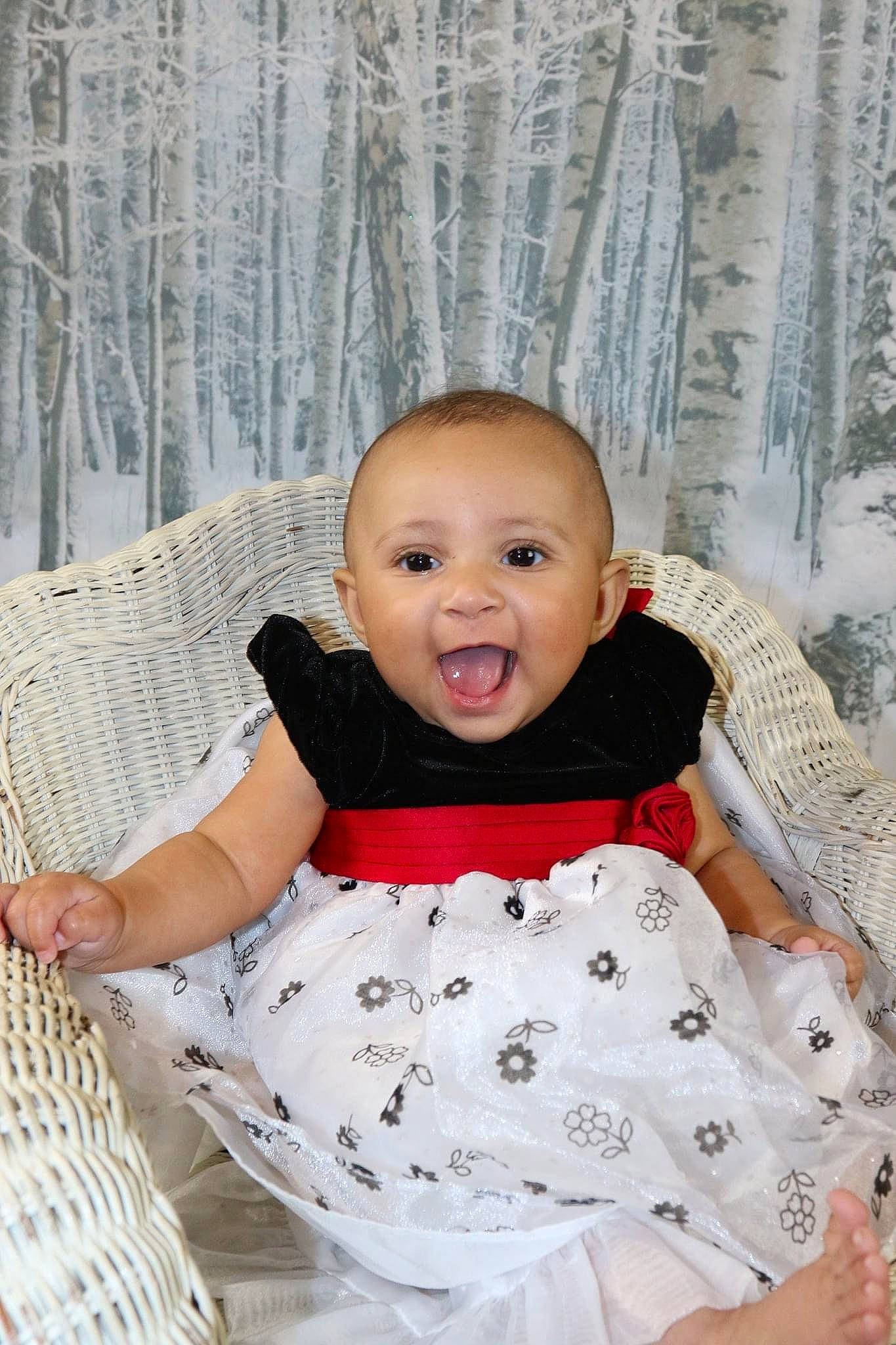 Kaelani joined the competition — help win amazing prizes! baby, baby_products, baby_toddler_clothing, child, comfort, dress, eye, face, flash_photography, happy, head, pattern, person, pink, product, sitting, sleeve, smile, textile, toddler