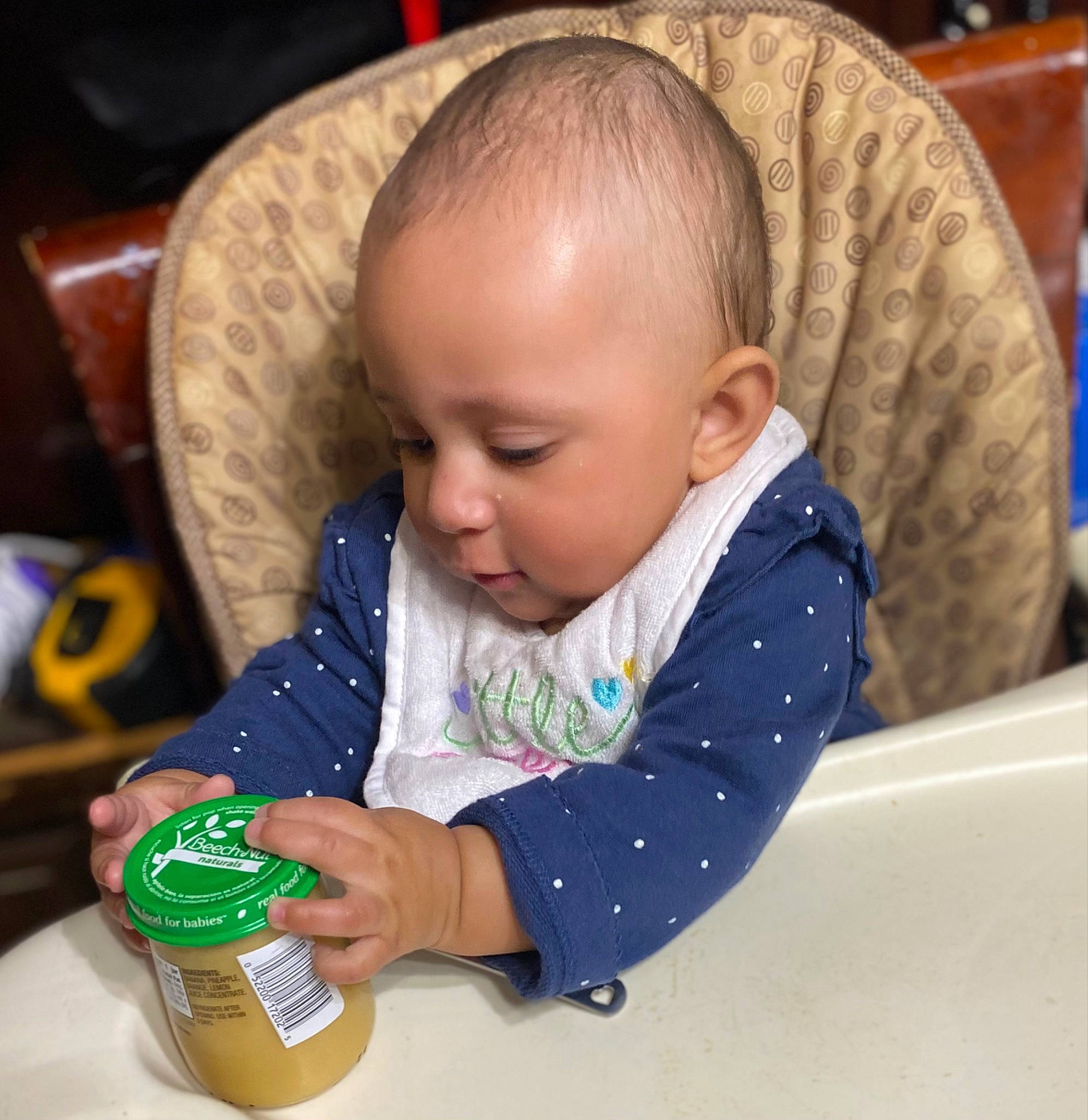 Kaelani is registered to the contest to win money with this photo: baby, baby_products, baby_toddler_clothing, bib, bottle, cheek, child, clothing, drink, drinking, drinkware, eye, fun, nose, person, plastic_bottle, product, sitting, skin, sleeve