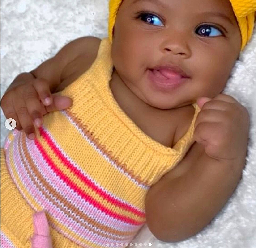 Amanda is registered to the contest to win money with this photo: baby, baby_toddler_clothing, cheek, child, craft, creative_arts, eyelash, finger, gesture, happy, headwear, lip, nail, neck, nose, person, skin, sleeve, textile, thumb