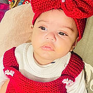 Noore joined the competition — help win amazing prizes! accessory, baby, child, couch, crib_slats, cute, eyes, face, headband, indoors, infant, knitted, lips, pillow, portrait, red_bow, red_dress, relaxed, skin, white_shirt