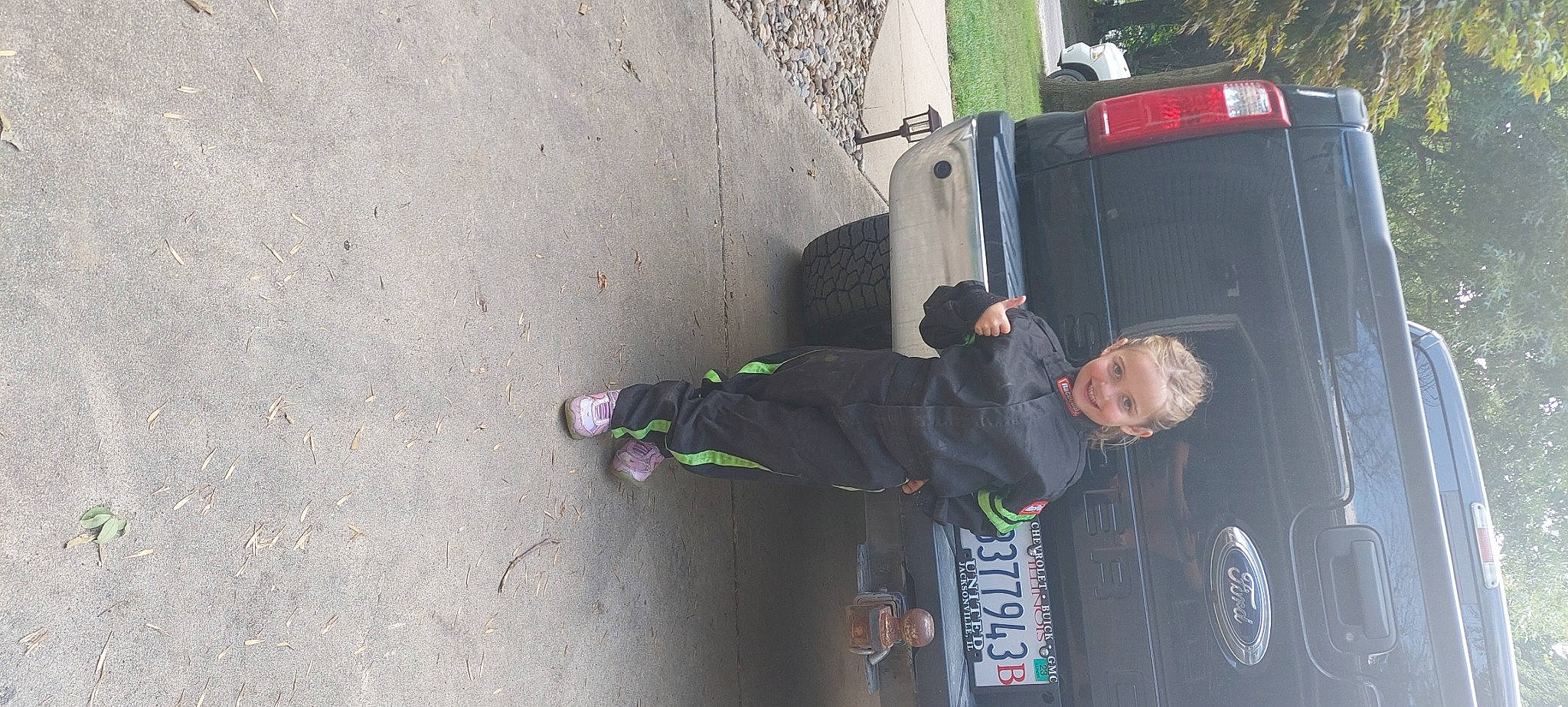 Macie joined the competition — help win amazing prizes! asphalt, automotive_design, automotive_exterior, automotive_lighting, automotive_tail_brake_light, automotive_tire, automotive_window_part, concrete, joy, motor_vehicle, person, plant, recreation, road, road_surface, rolling, sidewalk, tire, tree, vehicle