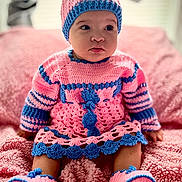 Yareyshka is registered to the contest to win money with this photo: baby, child, crochet, hat, dress, booties, pink, blue, blanket, sitting, cute, portrait, indoors, soft_texture, warm_clothing, knitted, infant, expression, face, person