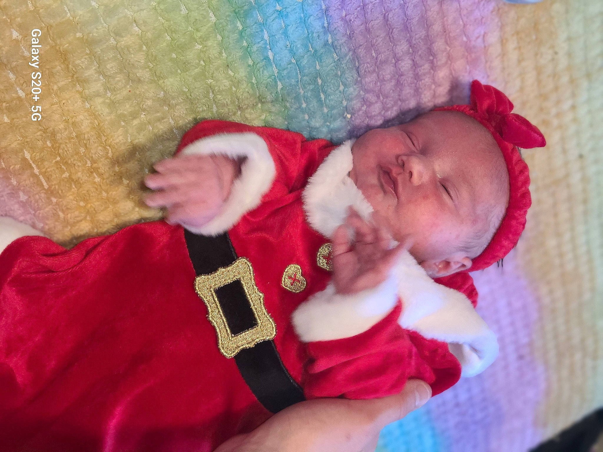 Aurora is registered to the contest to win money with this photo: baby, baby_sleeping, baby_toddler_clothing, carmine, cheek, child, comfort, eye, finger, hand, head, human_body, lap, linens, magenta, mouth, nose, person, room, skin