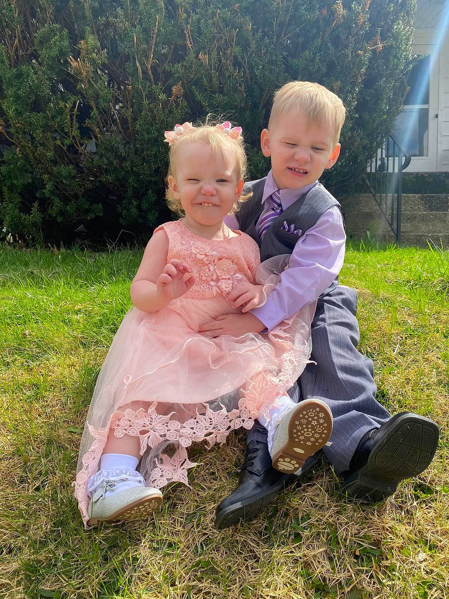 Lexi is registered to the contest to win money with this photo: baby, baby_toddler_clothing, chair, child, dress, formal_wear, fun, gesture, grass, grass_family, happy, human_body, joy, lawn, leaf, meadow, people_in_nature, person, plant, smile