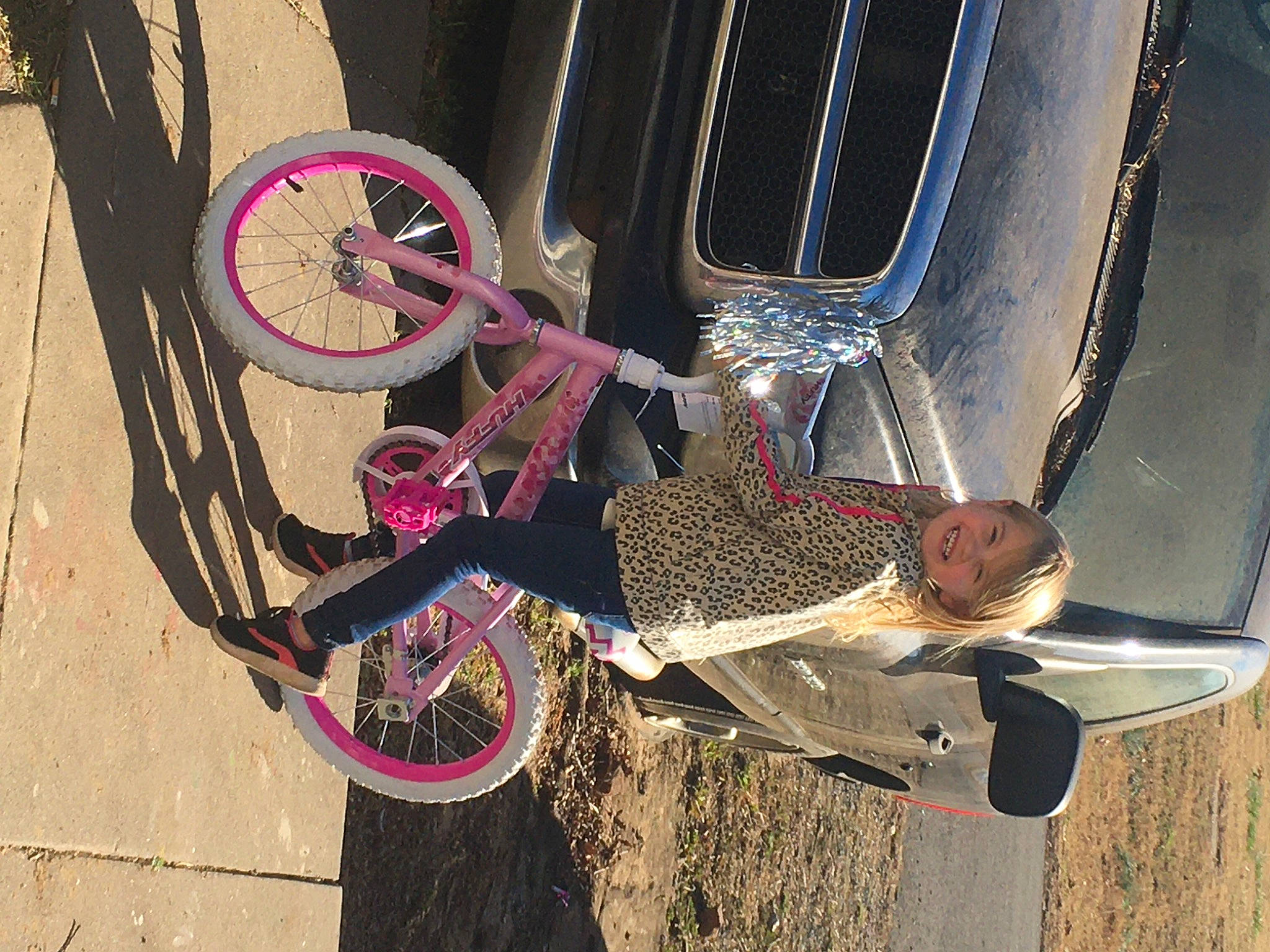 Macey is registered to the contest to win money with this photo: auto_part, automotive_exterior, automotive_tire, automotive_wheel_system, bicycle, bicycle_accessory, bicycle_drivetrain_part, bicycle_frame, bicycle_part, bicycle_tire, bicycle_wheel, bicycle_wheel_rim, fender, groupset, joy, magenta, person, rim, spoke, synthetic_rubber