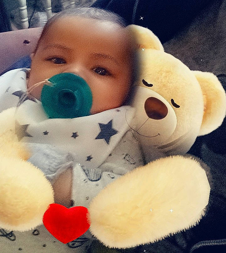 Josiah joined the competition — help win amazing prizes! baby_toys, carmine, cheek, child, eyelash, fun, fur, happy, mammal, nose, person, plastic, plush, room, stuffed_toy, teddy_bear, textile, toddler, toy, vertebrate