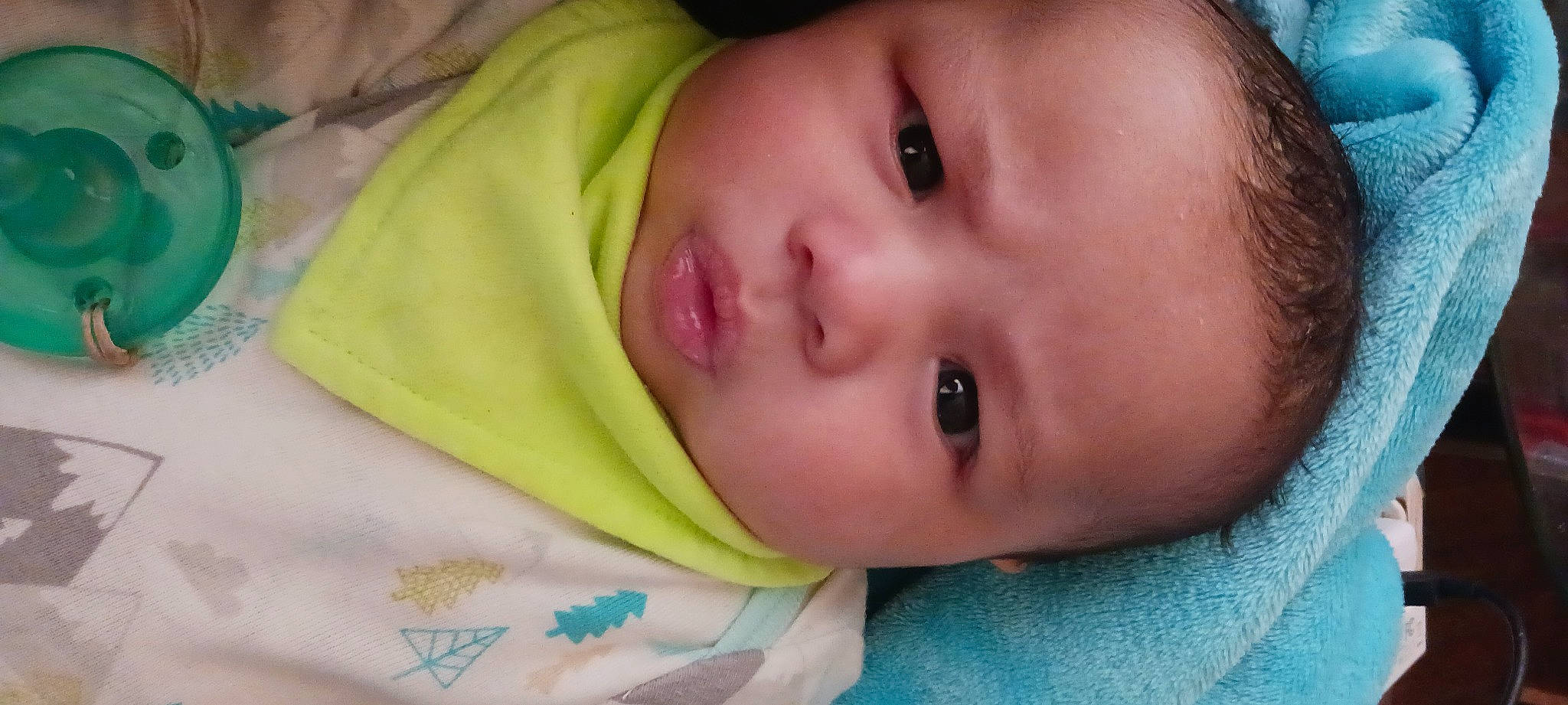 Josiah joined the competition — help win amazing prizes! baby, baby_toddler_clothing, cheek, child, close_up, comfort, eyebrow, eyelash, happy, human_body, iris, linens, lip, mouth, neck, no_expression, nose, person, portrait_photography, skin