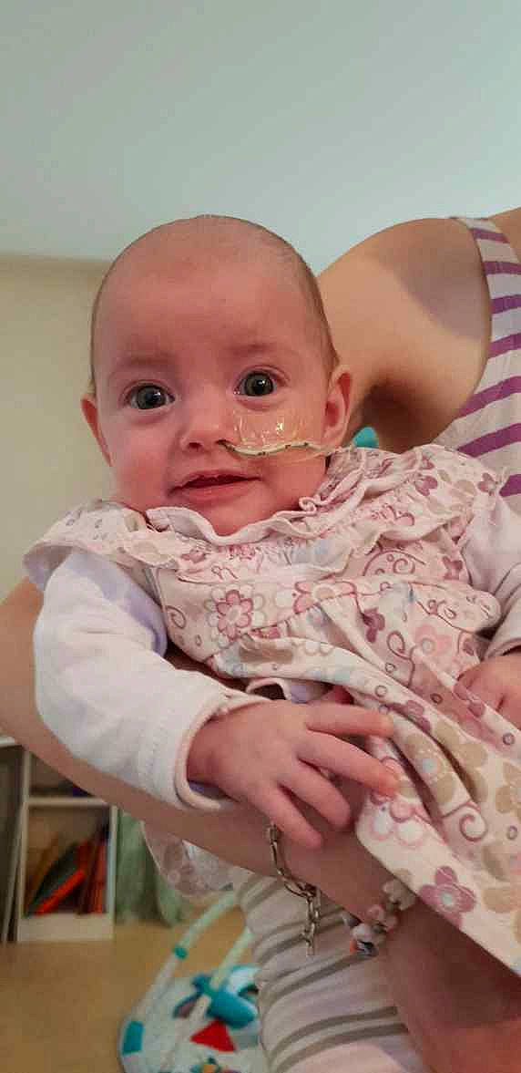 Annabella participe au concours pour gagner de l'argent avec cette photo : baby, baby_products, cheek, child, eye, face, finger, forehead, head, lip, mouth, nose, person, pink, skin, smile, toddler