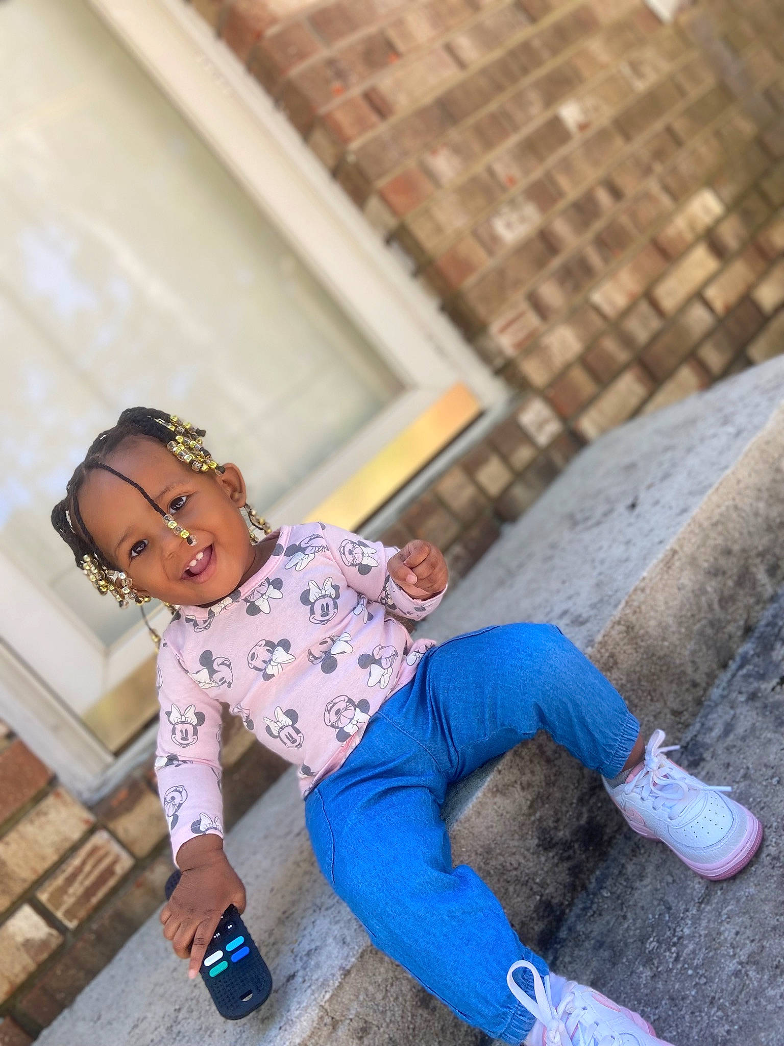 Selena joined the competition — help win amazing prizes! child, denim, electric_blue, eyewear, flooring, fun, happy, human_leg, joint, joy, knee, leisure, pattern, person, sandal, shoe, sitting, sneakers, t_shirt, thigh