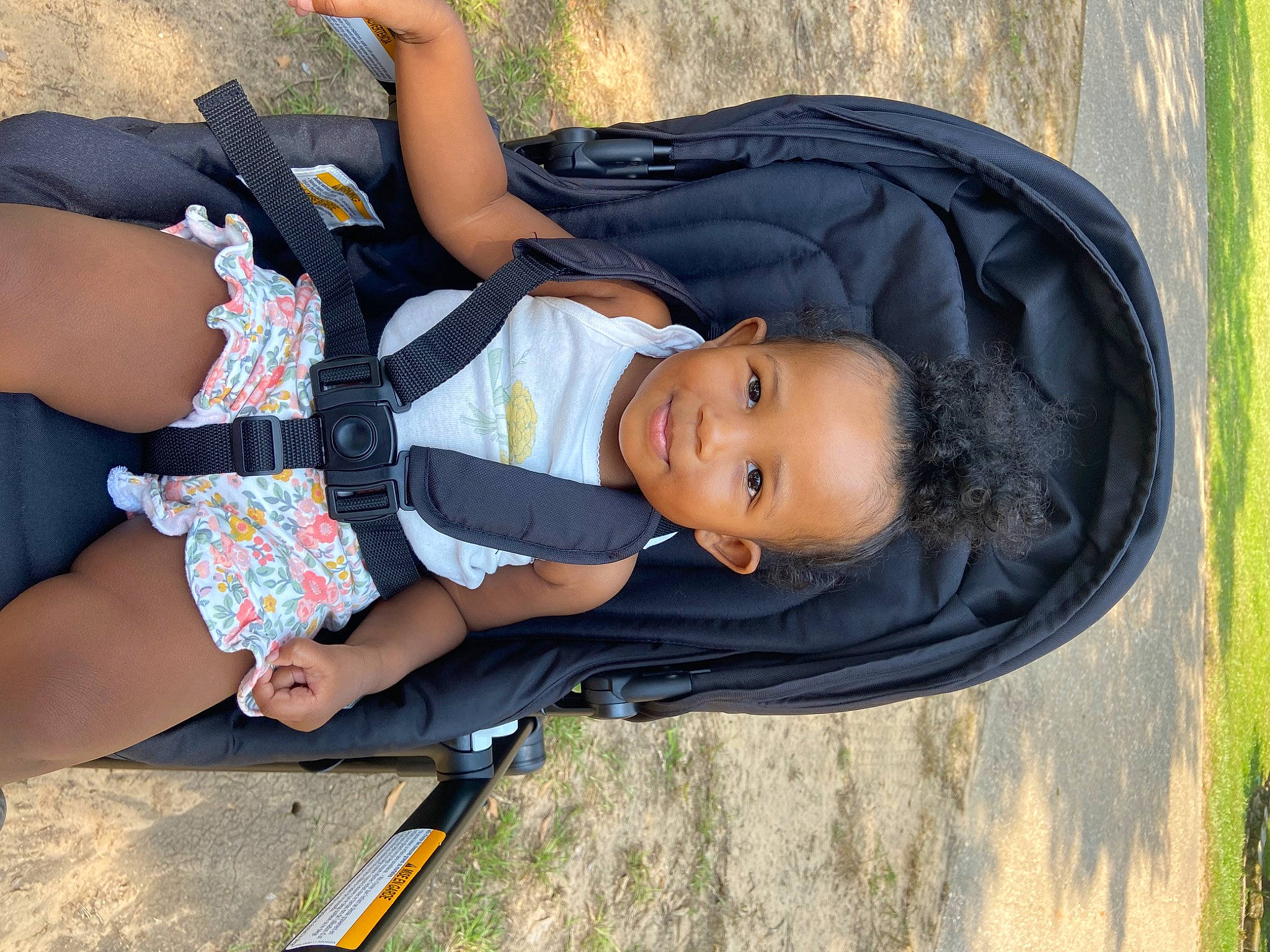 Selena joined the competition — help win amazing prizes! baby, baby_products, child, face, fun, grass, happy, human_leg, joy, lap, leisure, people_in_nature, person, plant, recreation, shorts, sitting, smile, thigh, toddler