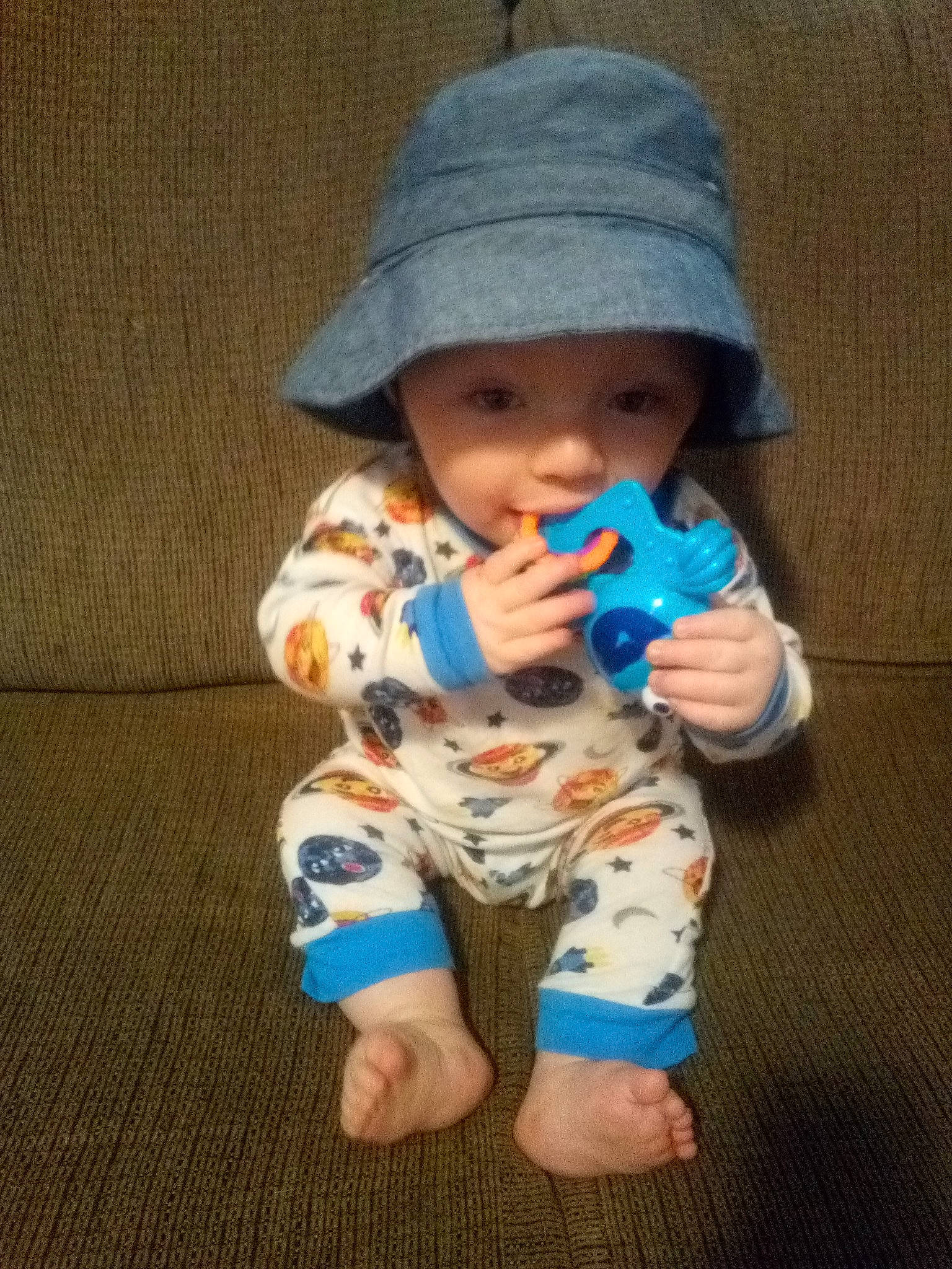 Phoenix is registered to the contest to win money with this photo: baby, baby_toddler_clothing, cap, child, headgear, headwear, person, play, toddler