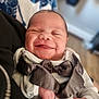 Zayvian joined the competition — help win amazing prizes! baby, smiling, face, infant, clothing, bow_tie, cute, person, portrait, newborn, hand, fabric, happy, closeup, soft_focus, indoor, skin, apparel, child, joy