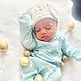 Zayvian is registered to the contest to win money with this photo: baby, sleeping, pajamas, hat, bunny, golden_eggs, blanket, soft_texture, cute, infant, peaceful, resting, indoors, child, newborn, face, closed_eyes, clothing, lying_down, adorable