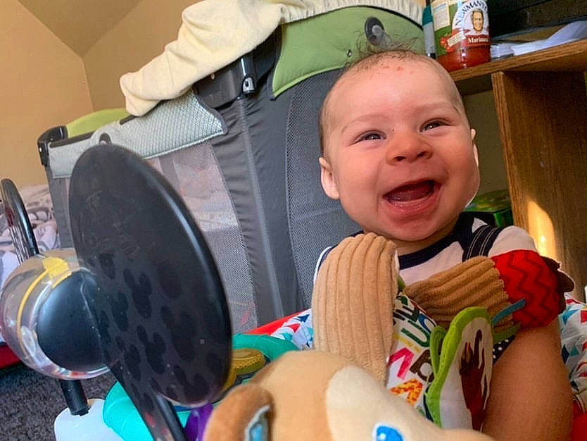 Kain joined the competition — help win amazing prizes! audio_equipment, baby, baby_products, blurred, event, finger, fun, hairstyle, happy, human_body, mouth, nail, person, personal_protective_equipment, shelf, sitting, skin, smile, snapshot, thigh