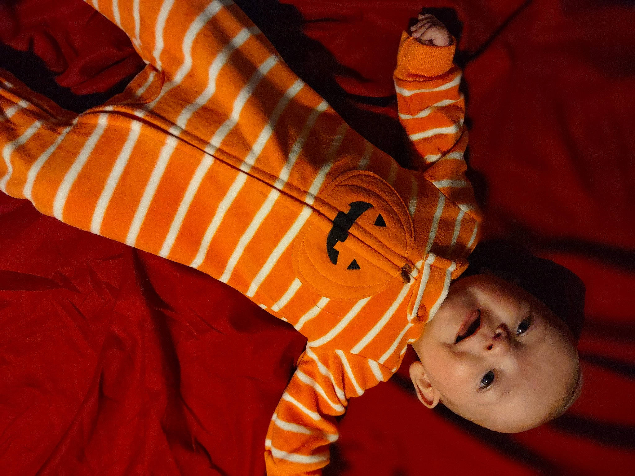 Mckenzie joined the competition — help win amazing prizes! baby, baby_toddler_clothing, brown, child, comfort, couch, event, fashion_accessory, finger, fun, hand, happy, human_body, linens, orange, person, red, sleeve, textile, toddler