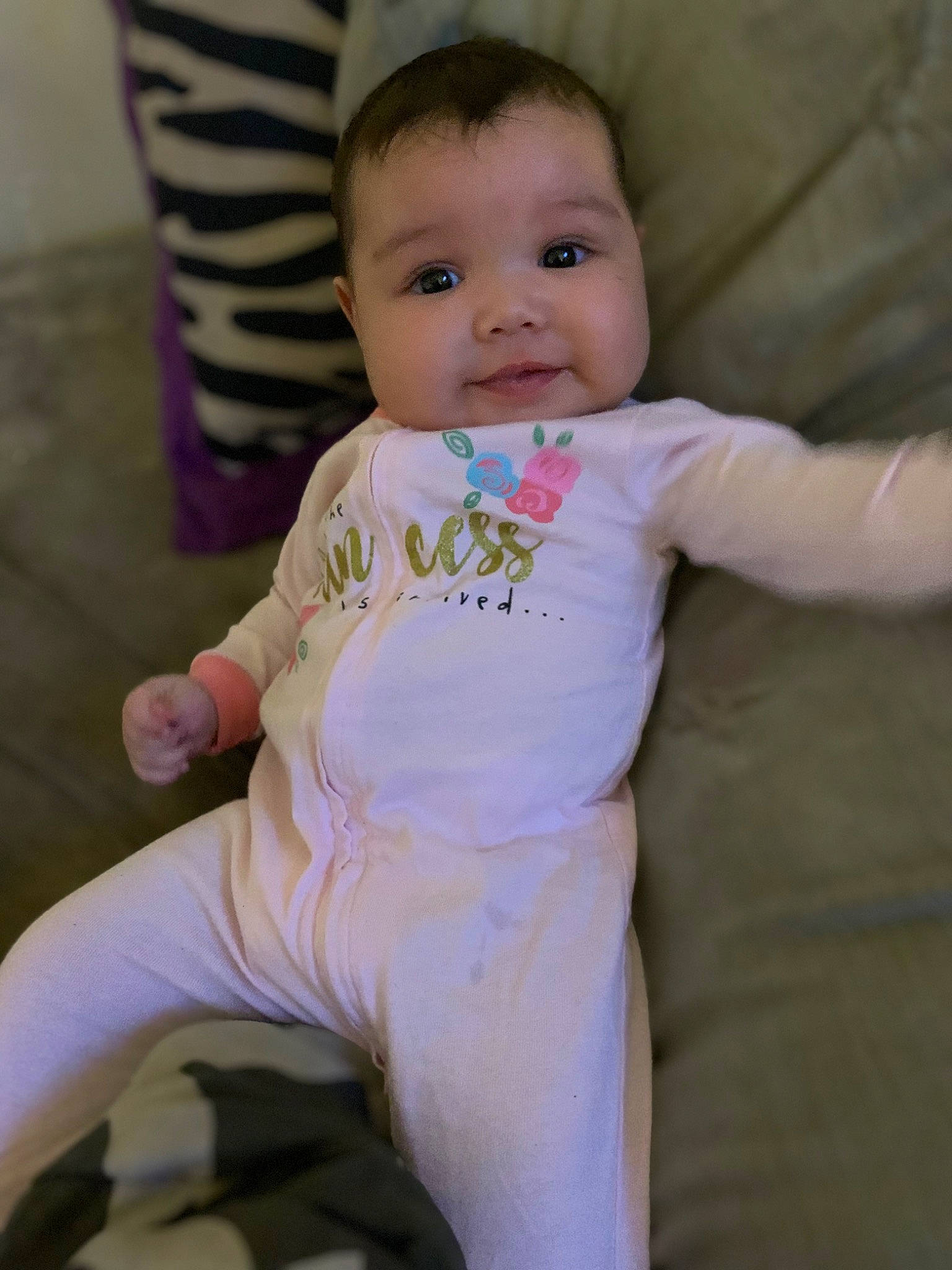 Shaniya joined the competition — help win amazing prizes! baby, baby_products, baby_toddler_clothing, cheek, child, comfort, eye, face, flooring, happy, head, knee, linens, person, pink, sitting, skin, sleeve, smile, t_shirt