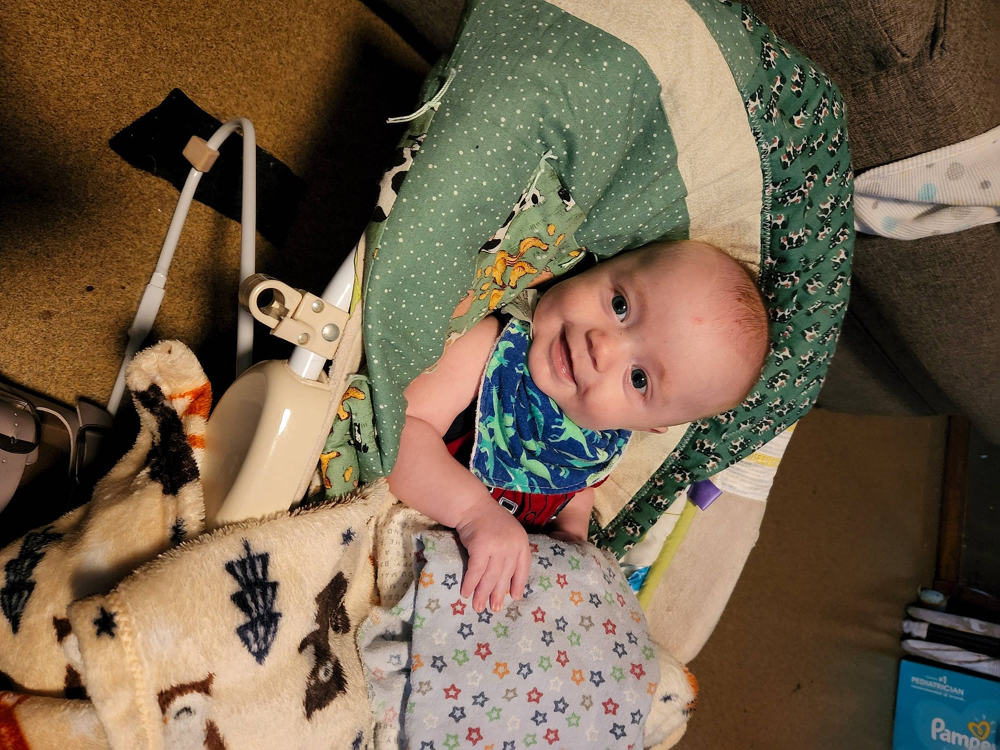 Caleb is registered to the contest to win money with this photo: baby, baby_products, baby_toddler_clothing, child, costume, dress, event, fashion, fashion_accessory, fun, happy, head, pattern, person, pink, purple, room, sitting, textile, toddler