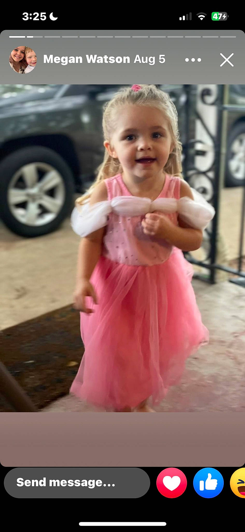 Chesney joined the competition — help win amazing prizes! automotive_tire, blond, car, dress, gesture, hair, hairstyle, happy, head, joy, person, pink, recreation, shoulder, skin, sleeve, smile, thumb, tire, toddler