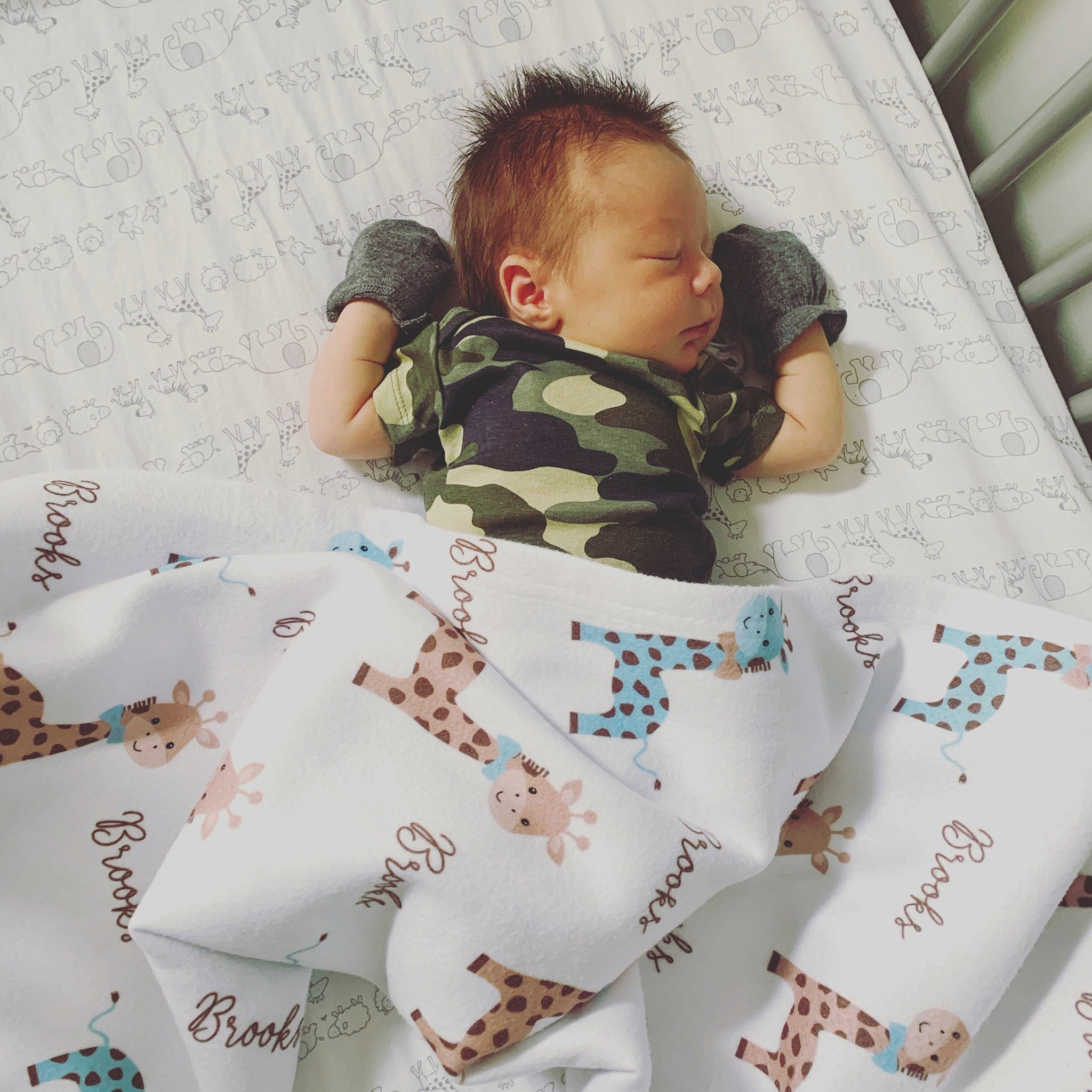 Brooks is registered to the contest to win money with this photo: baby, baby_sleeping, baby_toddler_clothing, bed_sheet, bedding, child, comfort, cool, design, font, happy, linens, pattern, person, room, sleeve, stuffed_toy, t_shirt, textile, thigh