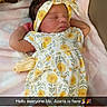 newborn, baby, sleeping, infant, portrait, floral_dress, headband, bow, sunflower, pink_blanket, lying_down, indoors, nursery, baby_clothing, peaceful, face, arms, legs, snapchat_overlay, announcement