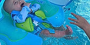 Greyson is registered to the contest to win money with this photo: baby, infant, pool, water, inflatable, float, sunshade, smiling, happy, child, swimming, blue, safety, hand, summer, outdoor, cheerful, splash, playful, cute