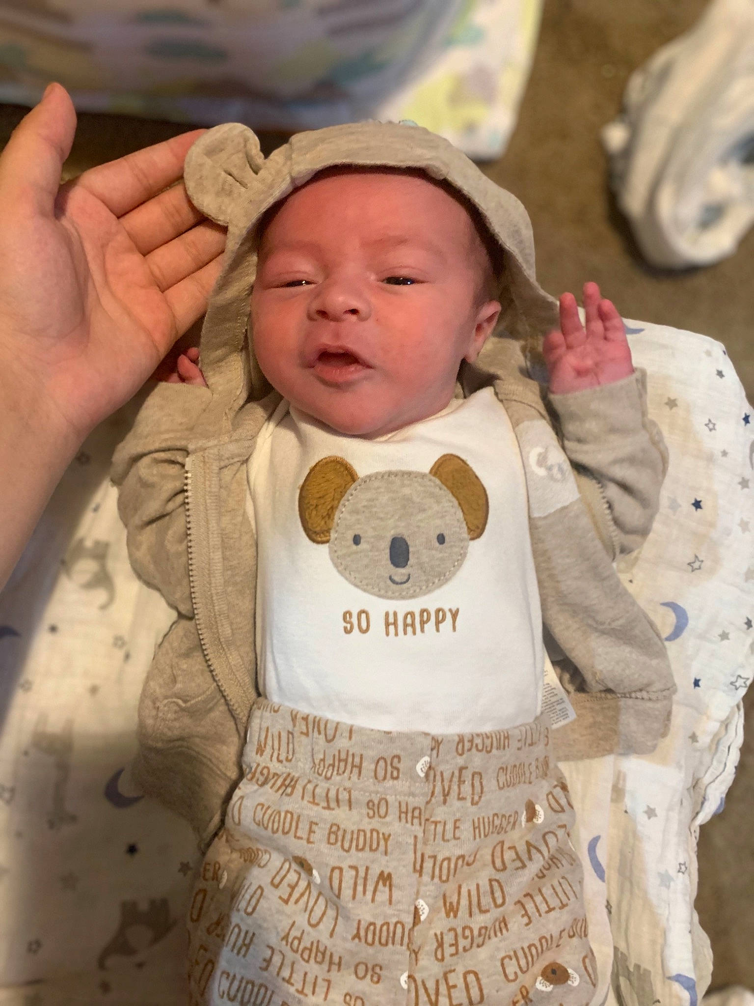 Izaiah joined the competition — help win amazing prizes! baby, baby_products, baby_toddler_clothing, cap, cheek, child, finger, gesture, happy, hat, human_body, lip, nose, pattern, person, pink, skin, sleeve, tire, toddler