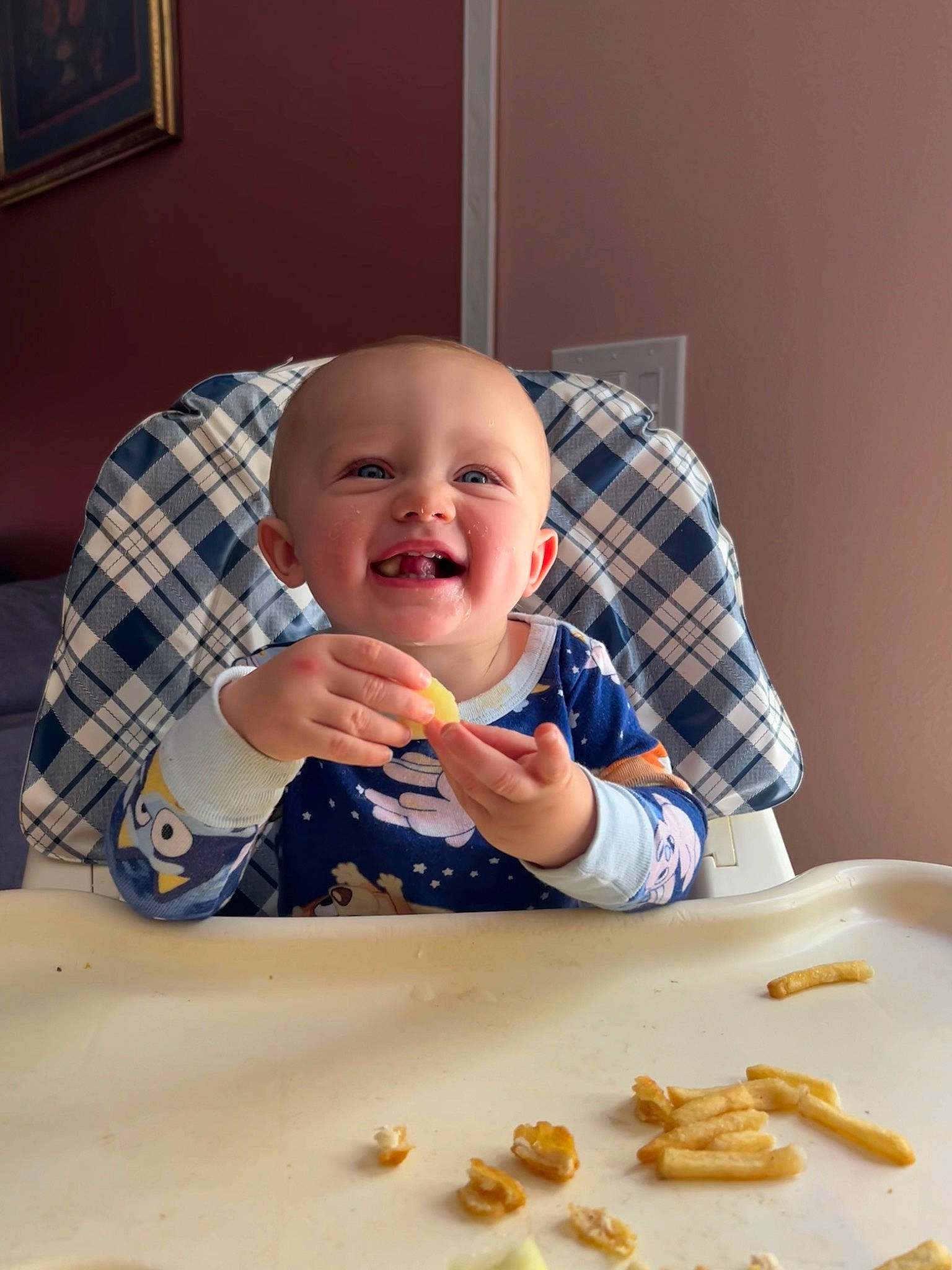 Gunner joined the competition — help win amazing prizes! arm, baby, baby_grabbing_for_something, baby_toddler_clothing, biting, chair, child, eye, finger, food, food_craving, joy, nut, person, picture_frame, plaid, sleeve, smile, t_shirt, tartan
