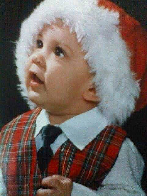 Jake joined the competition — help win amazing prizes! baby, baby_toddler_clothing, cap, child, collar, costume_hat, dress_shirt, fur, happy, hat, headwear, pattern, person, plaid, shirt, sleeve, surprise, tartan, textile, thumb