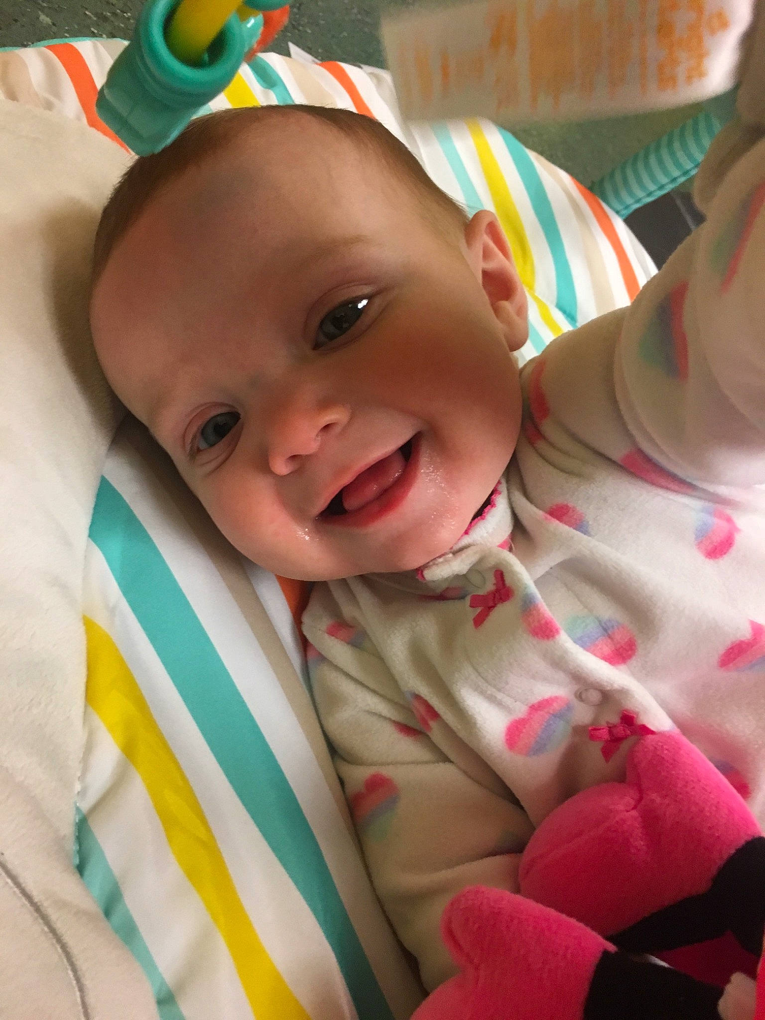 Madelynn is registered to the contest to win money with this photo: baby_products, cheek, child, day, ear, eye, girl, head, human_hair_color, infant, iris, mouth, nose, organ, person, pink, play, product, skin, smile