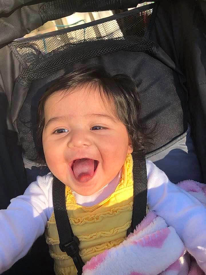 Lilyana joined the competition — help win amazing prizes! baby, cheek, chin, eye, gesture, happy, head, iris, lip, mouth, nose, outerwear, person, pink, product, skin, sleeve, smile, tongue, tooth