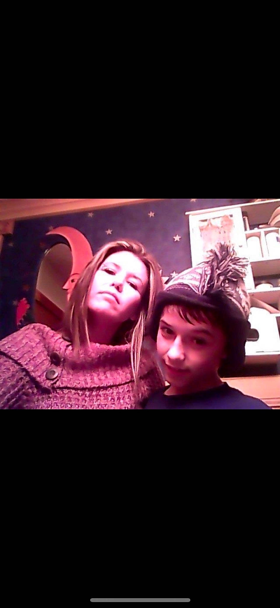 Dylan joined the competition — help win amazing prizes! darkness, entertainment, event, flash_photography, flesh, font, fun, gesture, hat, magenta, midnight, neon, night, performance, performing_arts, person, purple, room, t_shirt, under_exposed