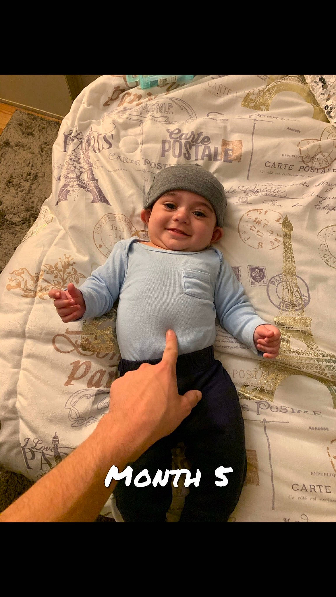 Dylan joined the competition — help win amazing prizes! baby, child, comfort, flash_photography, font, fun, gesture, happy, headwear, joy, leisure, linens, pattern, person, photo_caption, portrait_photography, room, sitting, sleeve, smile