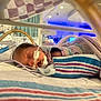 newborn, baby, incubator, hospital, medical_equipment, blanket, sleeping, tubes, healthcare, patient, neonatal, care, cute, infant, bed, monitor, wrapped, quiet, indoors, resting